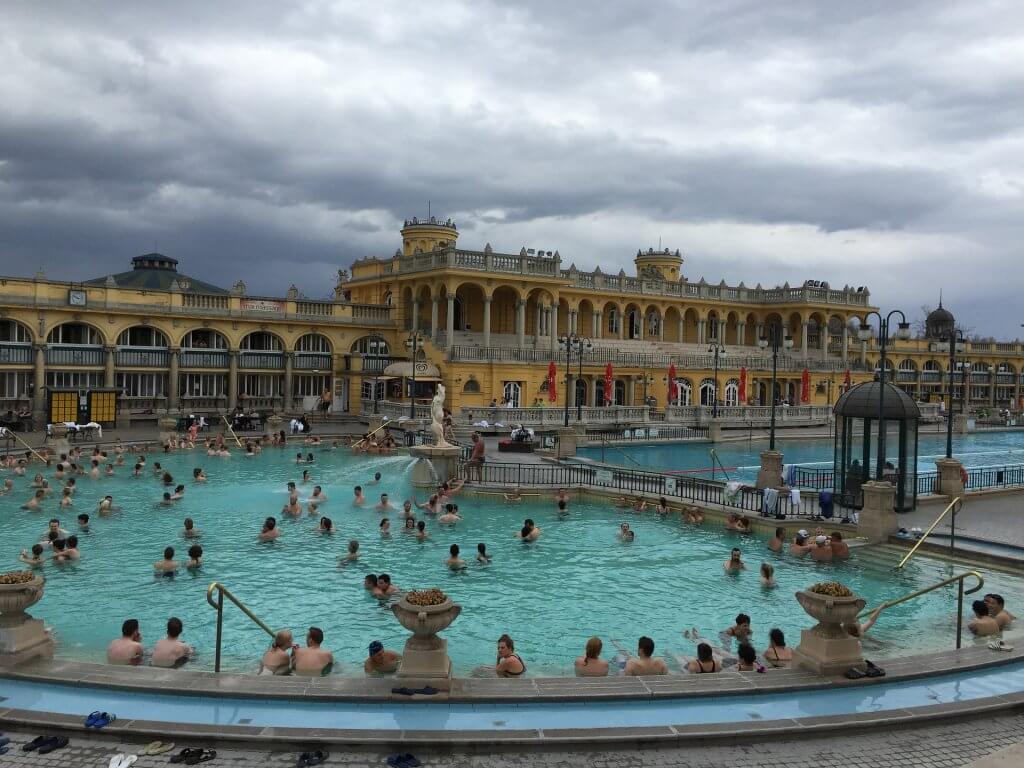 People soaking in thermal baths in Budapest