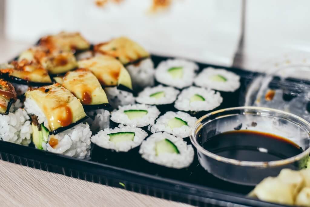 close up of a sushi takeout container