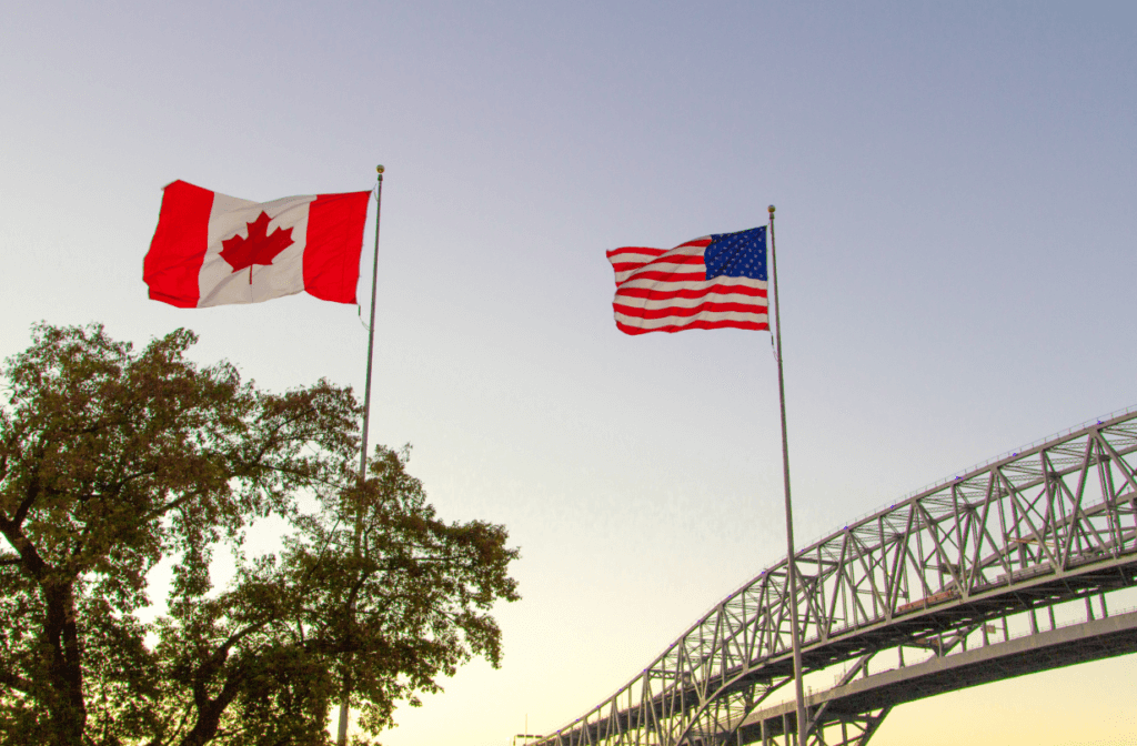 american and canadian flags for story on Global Entry vs. TSA PreCheck vs. CLEAR