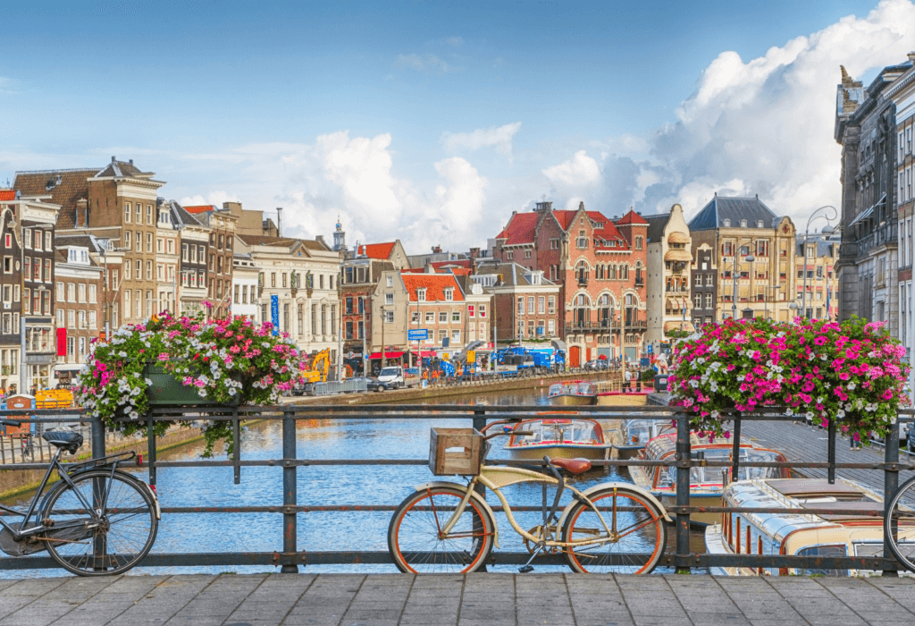 bike in Amsterdam, one of the Cheapest European Cities to Fly Into