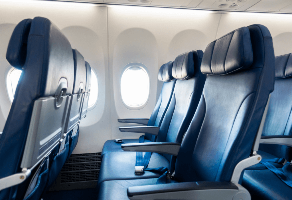 row of airplane seats for article on the best airlines for legroom to europe economy | dollar flight club