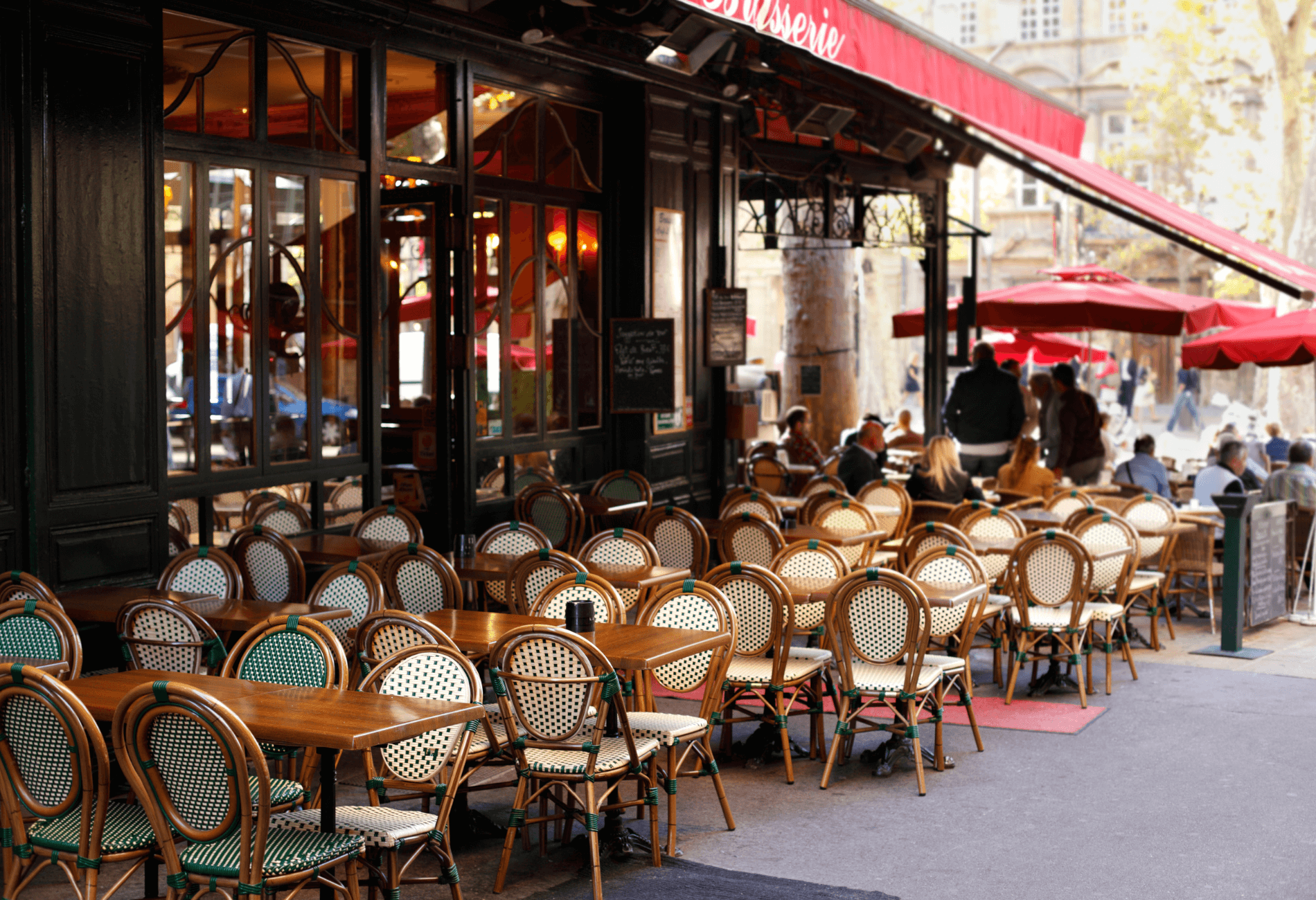 Parisian cafe for article on the cheapest places in Europe to fly into | Dollar Flight Club