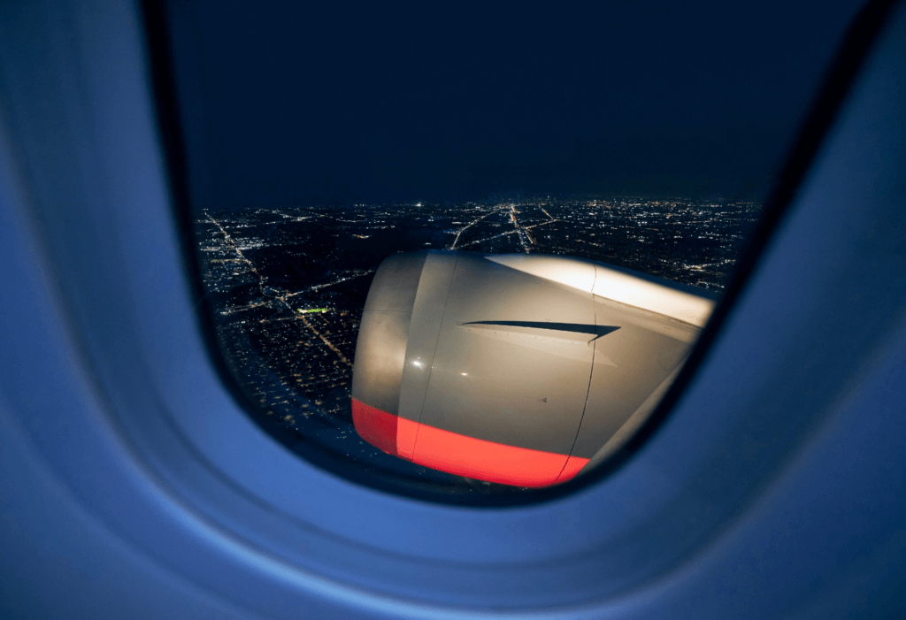 airplane window, what is a redeye flight, when should i arrive for a midnight flight