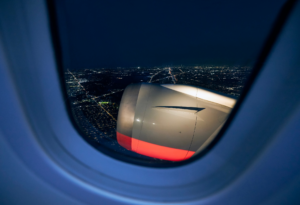 airplane window, what is a redeye flight, when should i arrive for a midnight flight