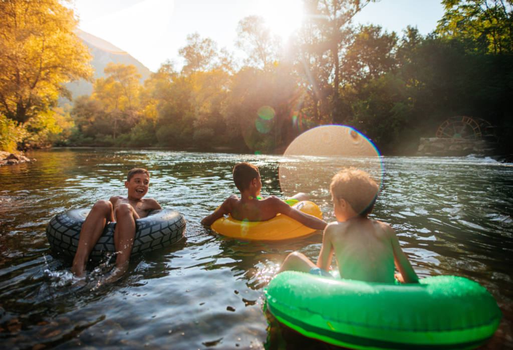 kids doing a river float