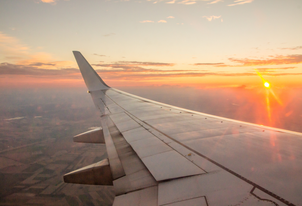 plane at sunset | what is a long-haul flight