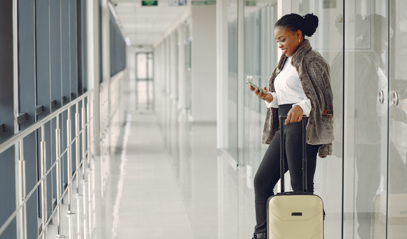 person on phone at airport